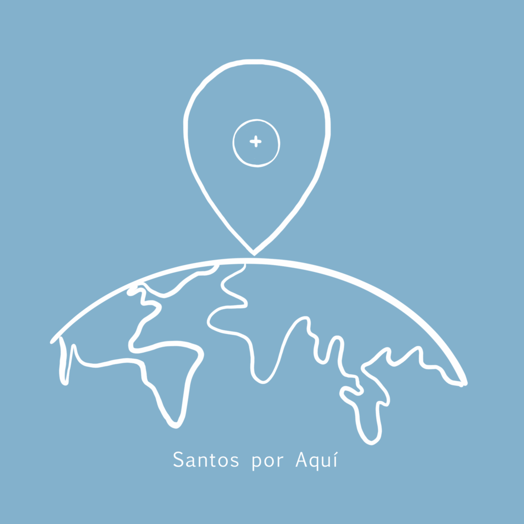 Logotipo de Santos por Aquí. Muestra un mundo con un ícono de ubicación arriba del mundo. En el centro del ícono de ubicación se encuentra la Eucaristía.